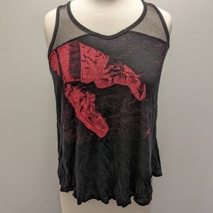 Black tank top with pointe shoes on it